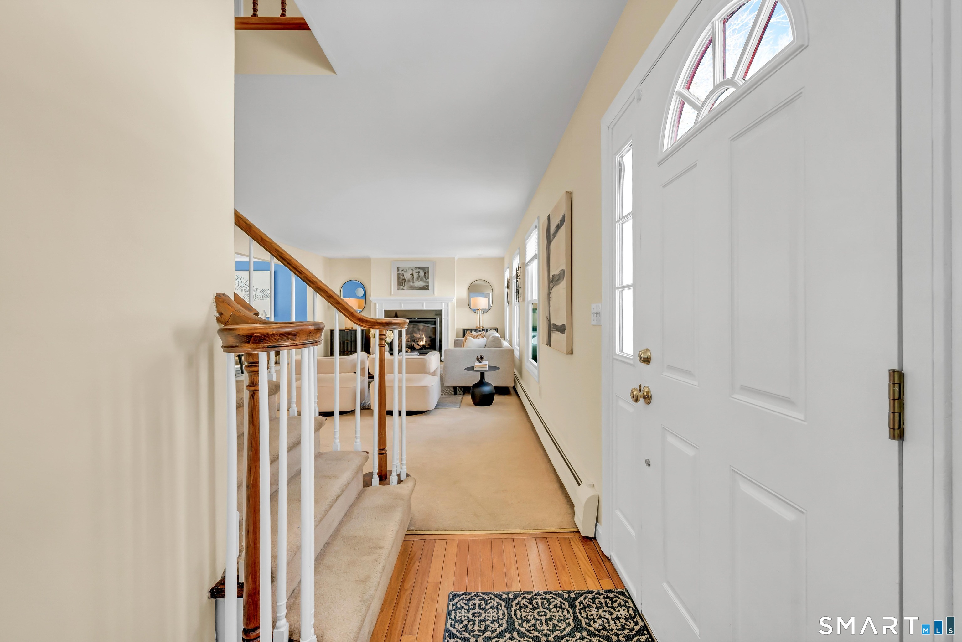 40 Middle River Road Danbury, CT 06811 - Photo 24 of 40 a view of a hallway with wooden floor and staircase