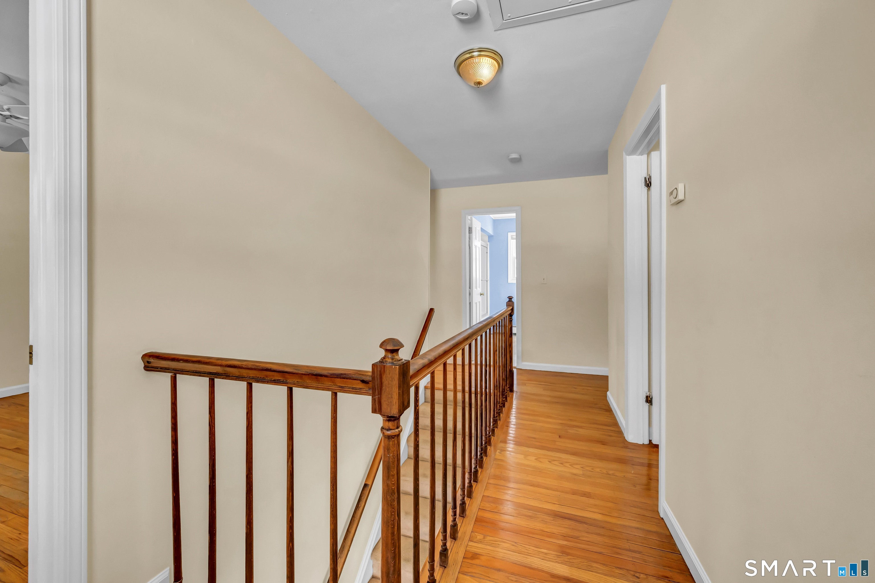 40 Middle River Road Danbury, CT 06811 - Photo 3 of 40 a view of a hallway with wooden floor