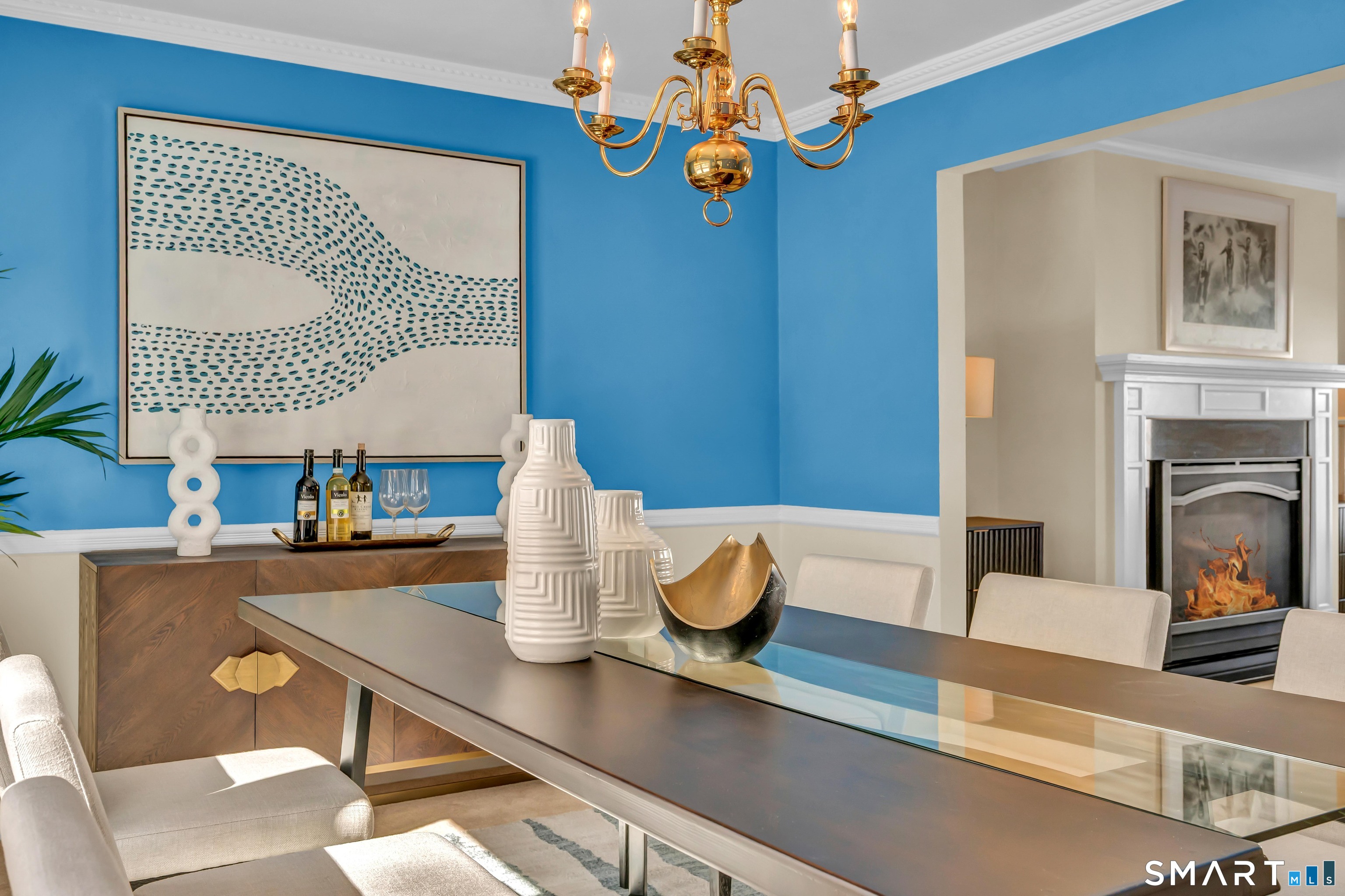 40 Middle River Road Danbury, CT 06811 - Photo 32 of 40 a living room with dining table and a fireplace