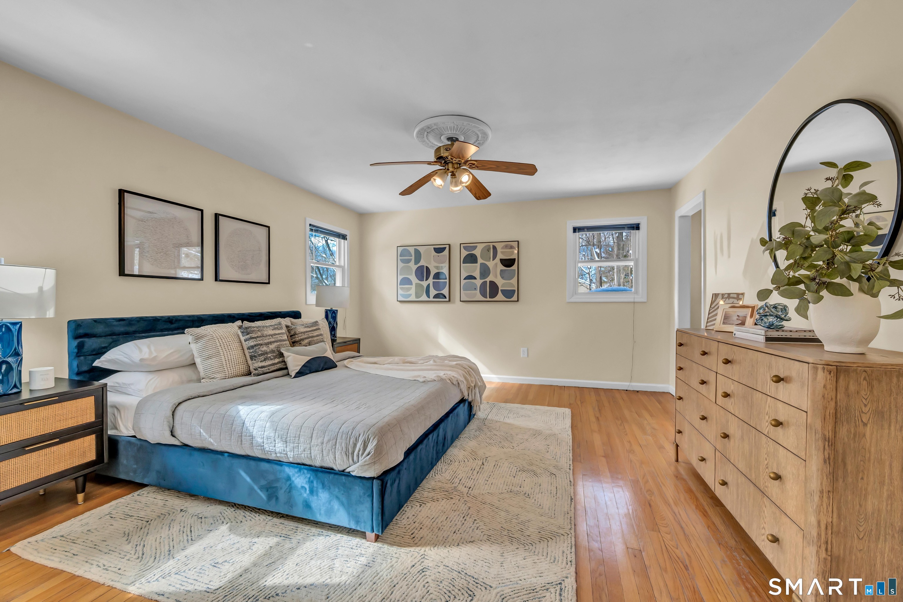 40 Middle River Road Danbury, CT 06811 - Photo 4 of 40 a bedroom with a large bed and a dresser