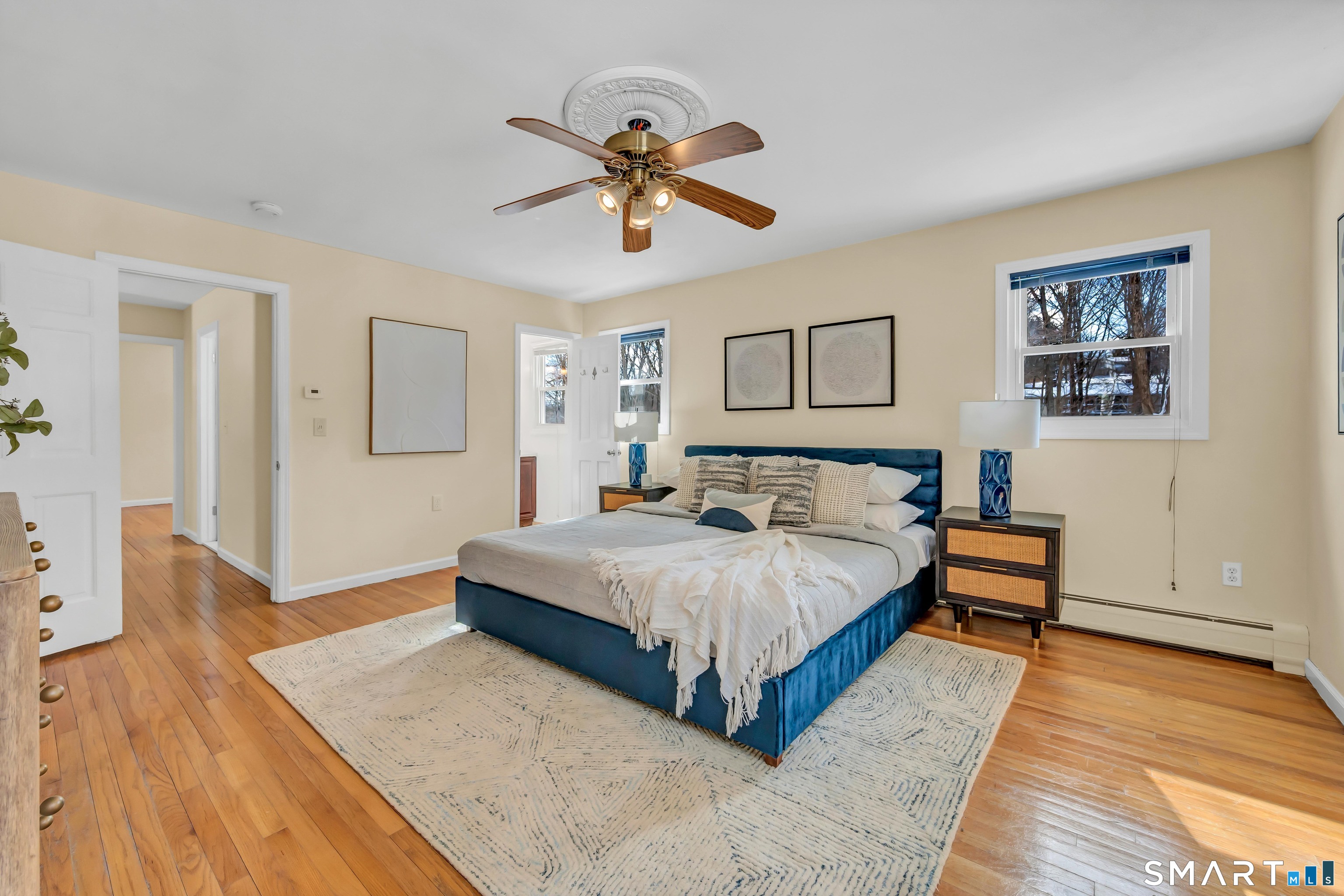 40 Middle River Road Danbury, CT 06811 - Photo 6 of 40 a spacious bedroom with a bed and a dresser
