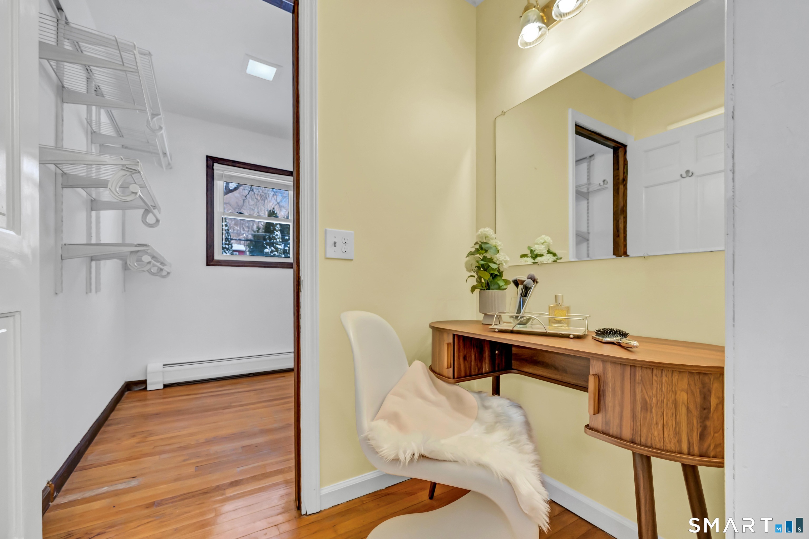 40 Middle River Road Danbury, CT 06811 - Photo 8 of 40 a view of a room with wooden floor and cabinet