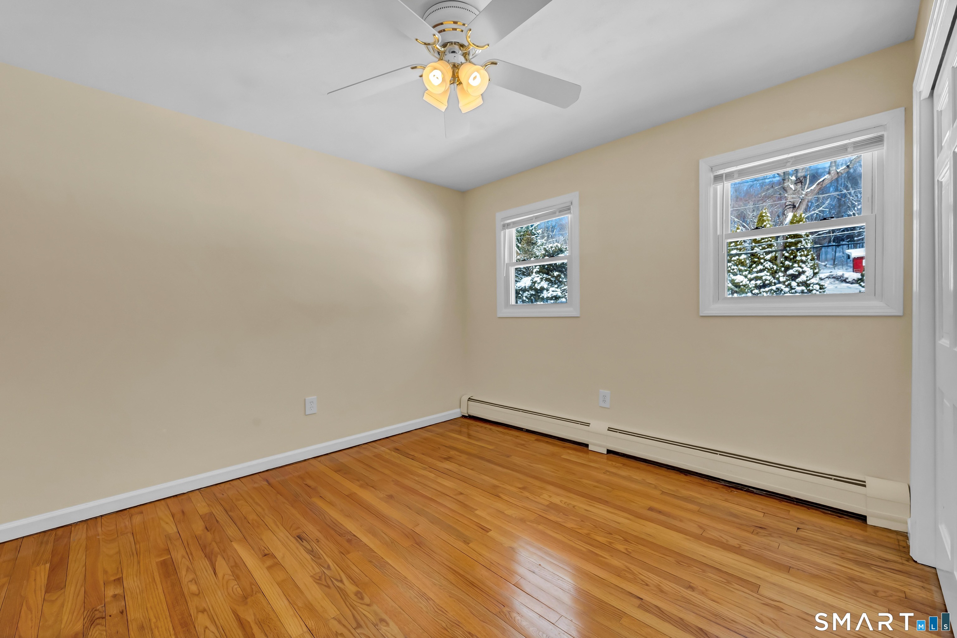 40 Middle River Road Danbury, CT 06811 - Photo 10 of 40 wooden floor in an empty room with a window