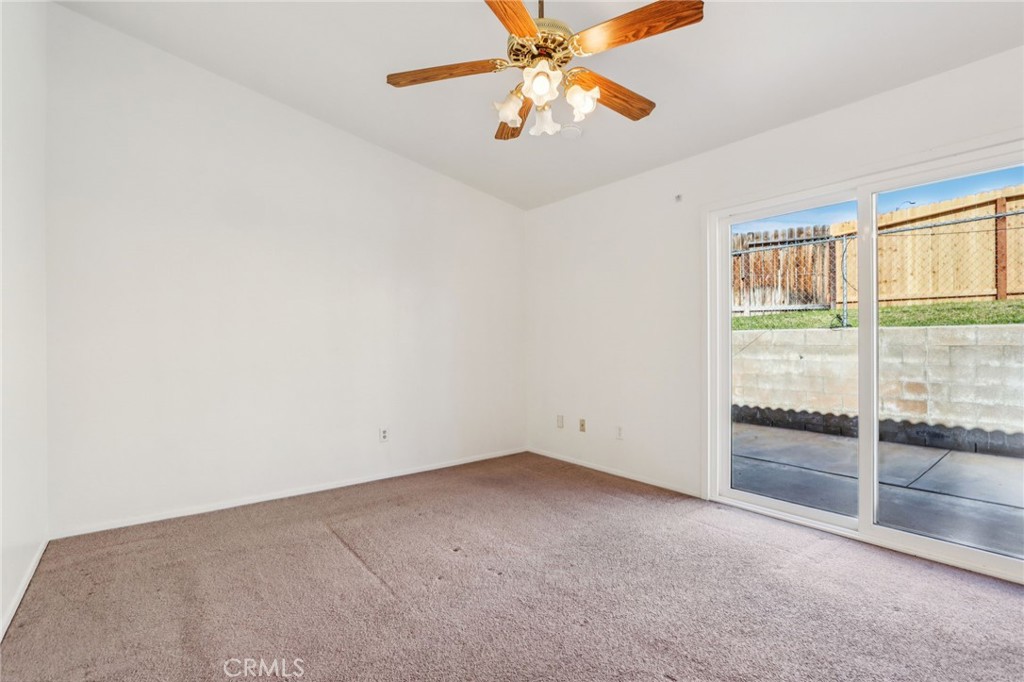 12059 Elk Boulevard Riverside, CA 92505 - Photo 20 of 29 an empty room with windows