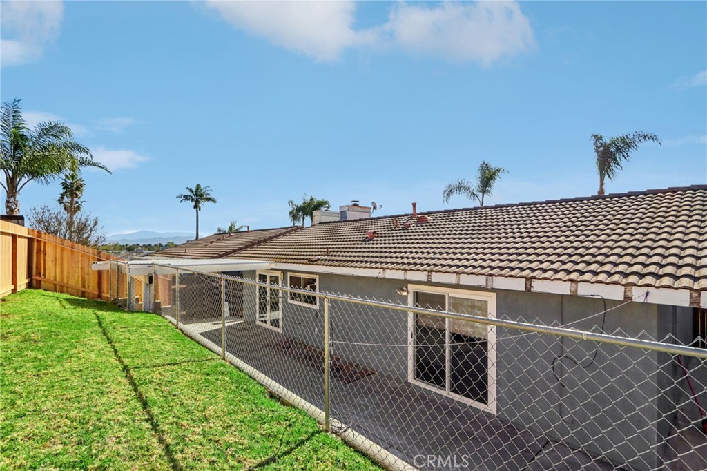 12059 Elk Boulevard Riverside, CA 92505 - Photo 27 of 29 a view of a house with a yard