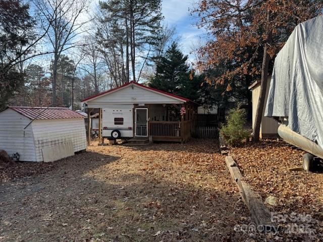 127 Deer Park Road Mount Gilead, NC 27306 - Photo 2 of 15 a front view of a house with garden