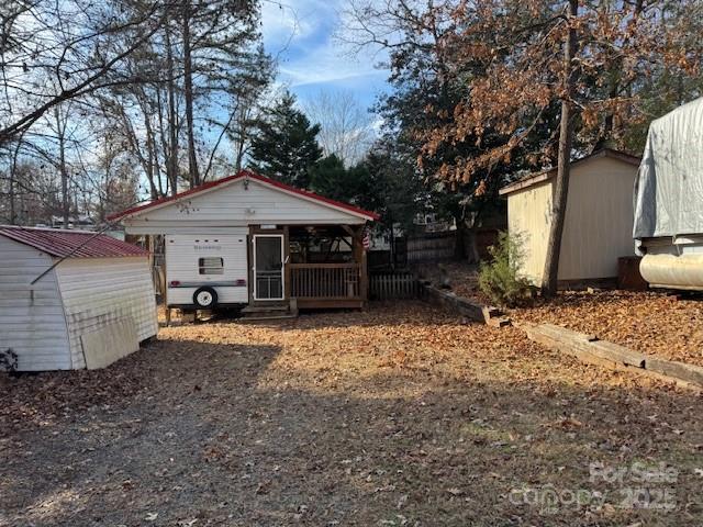 127 Deer Park Road Mount Gilead, NC 27306 - Photo 3 of 15 a view of a house with backyard and trees