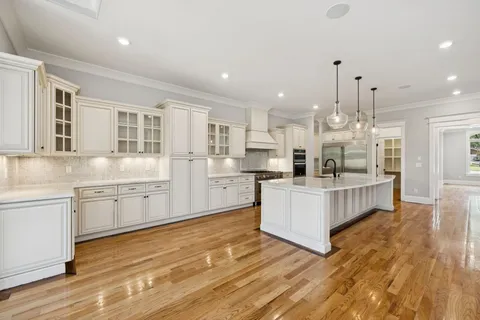 a view of a room with shelf on the wall