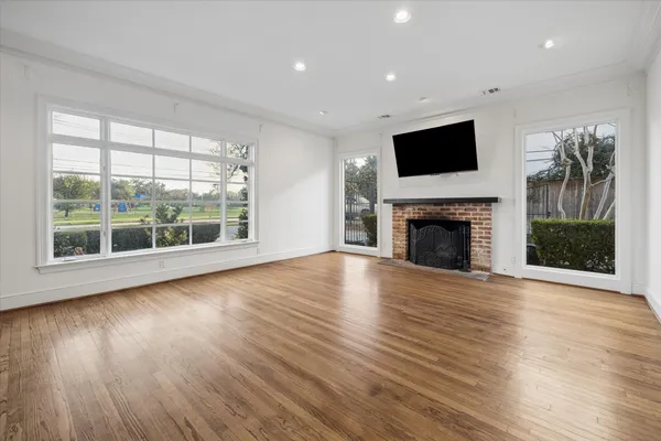 a kitchen with granite countertop lots of counter top space sink and stainless steel appliances