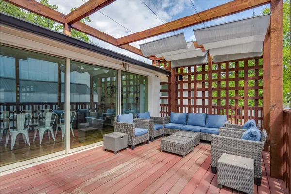 a outdoor living space with furniture and a potted plant