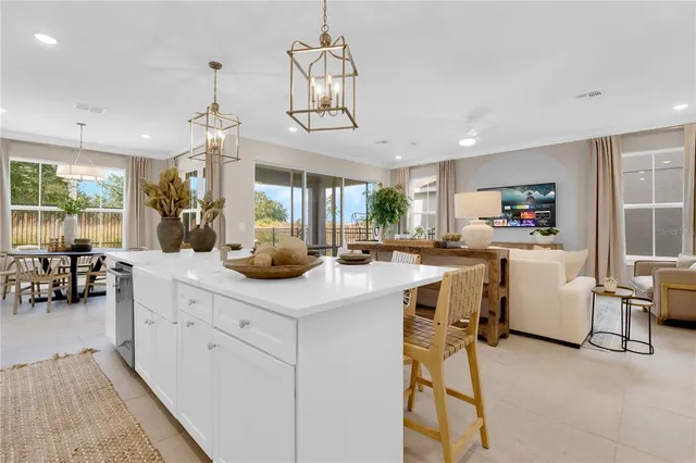 a bedroom with a bed and a potted plant