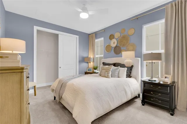 a living room with furniture and a mirror