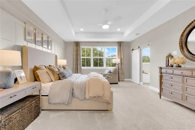 a bathroom with a toilet and a bathtub