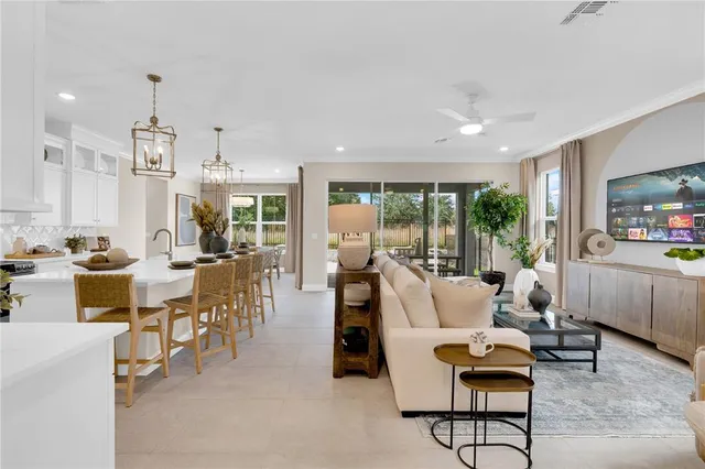 a view of a balcony with chairs and wooden floor