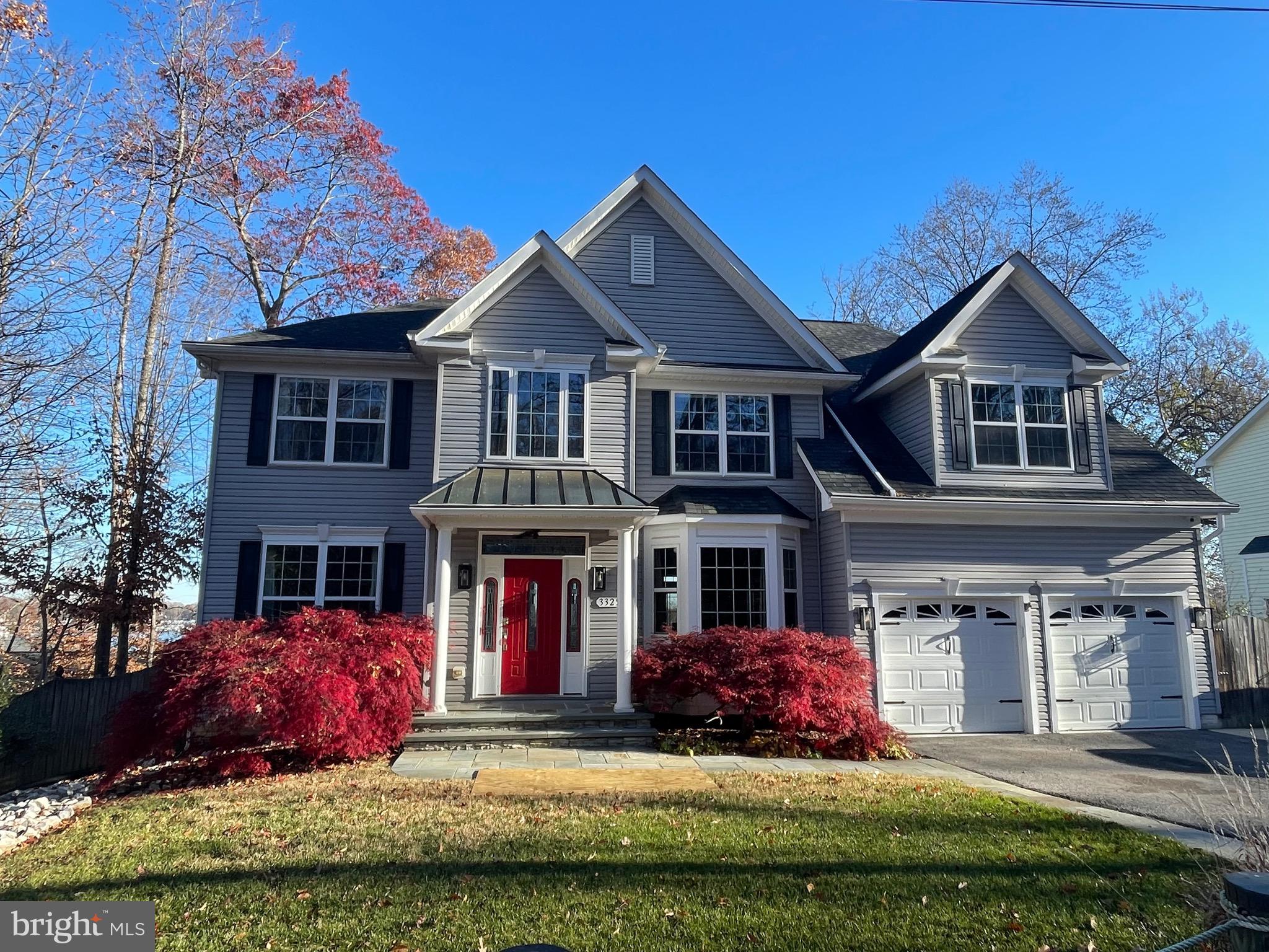 front view of a house with a yard