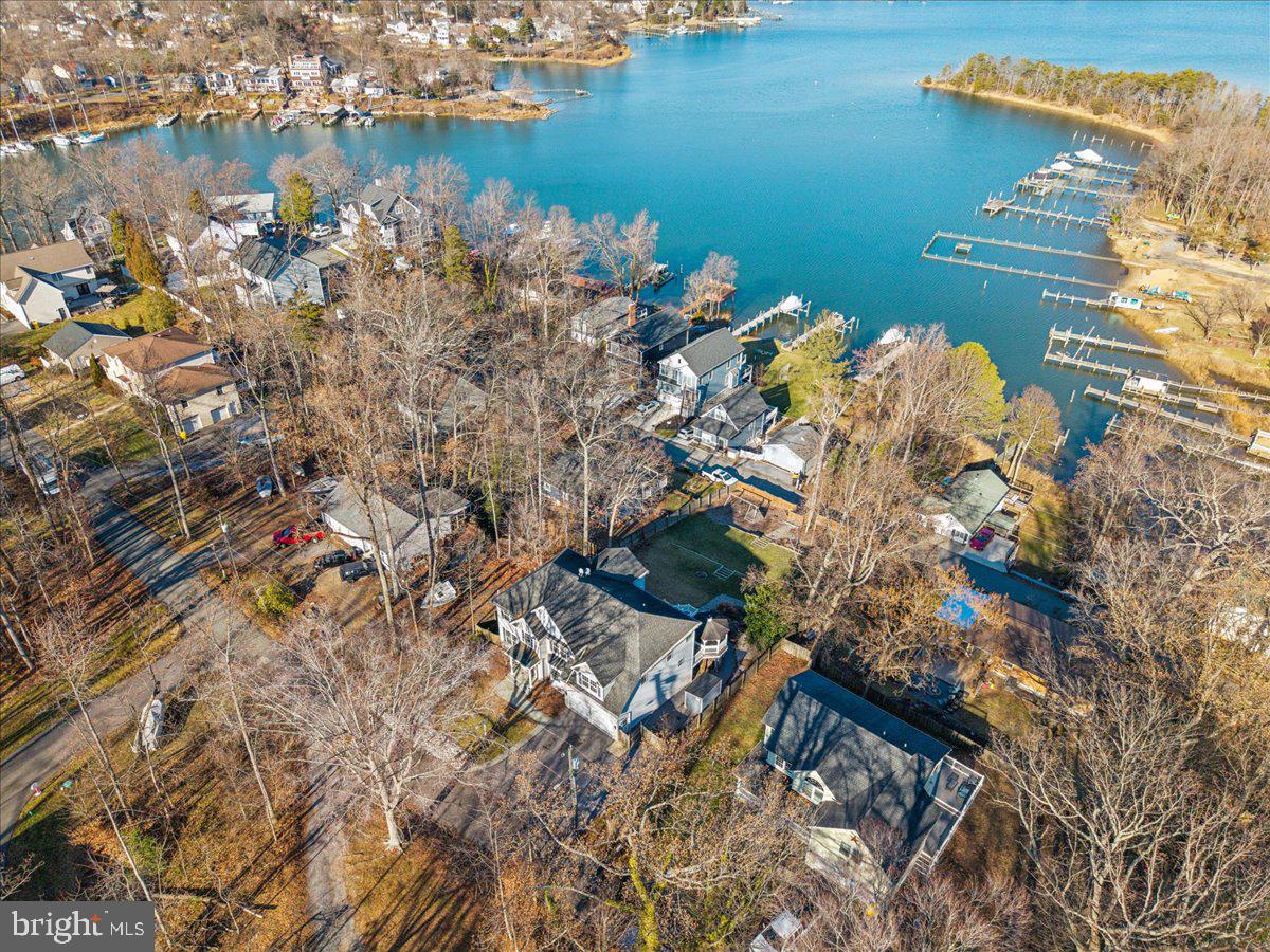3325 Glebe Drive Edgewater, MD 21037 - Photo 77 of 84 a view of a lake with a building in the background