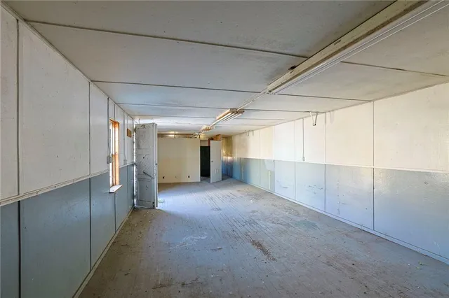 an aerial view of a yard with mountain