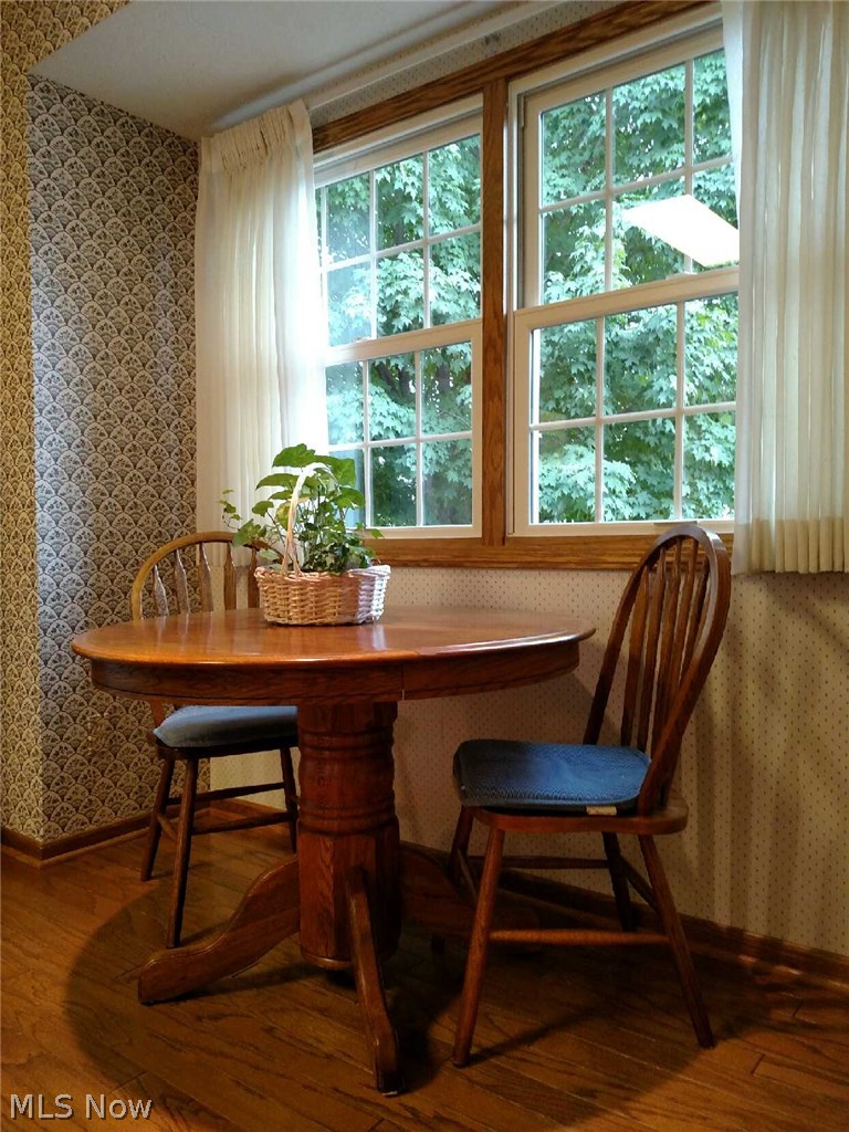 2608 Charing Cross Road Northwest Canton, OH 44708 - Photo 7 of 24 Bay window flooded with light is a perfect spot for a small table and chairs to enjoy morning coffee and the newspaper.