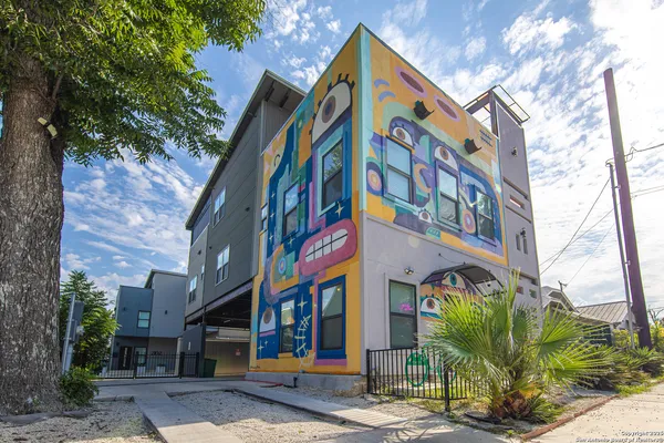 a view of a building with a street