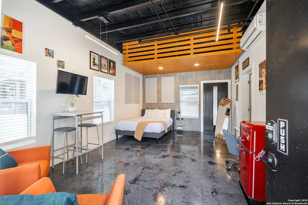 a bathroom with a sink and mirror
