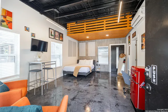 a bathroom with a sink and mirror