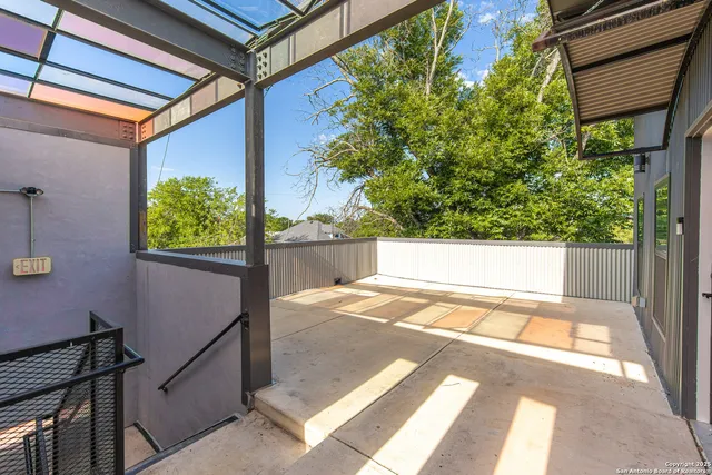 a view of backyard with seating space