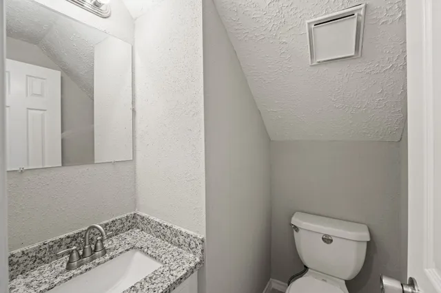 a bathroom with a toilet