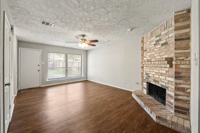 a view of livingroom with furniture and fireplace