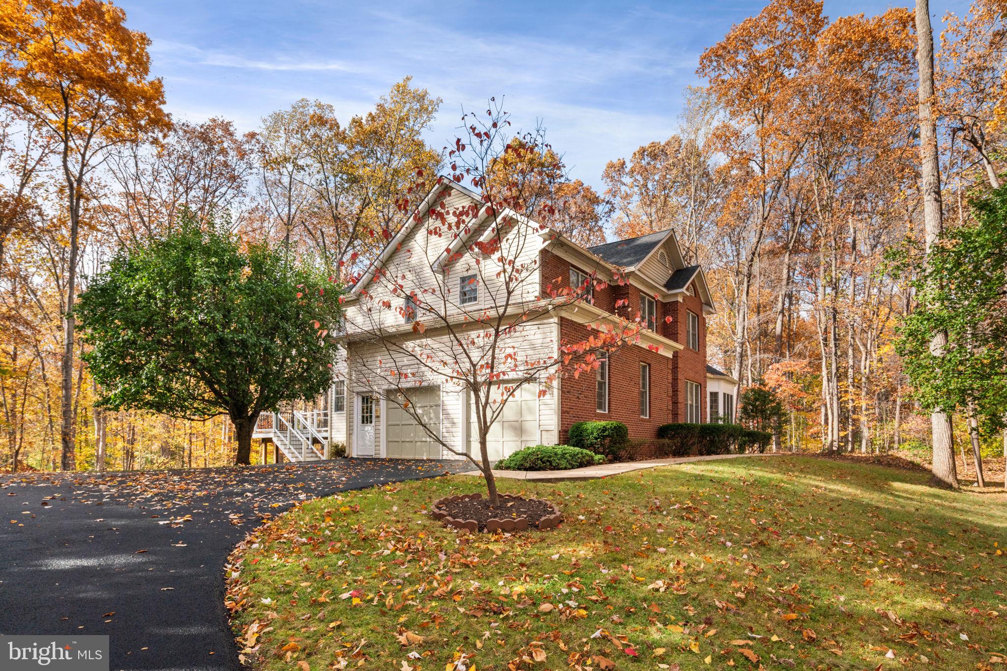 15 Riva Ridge Drive Stafford, VA 22556 - Photo 39 of 49 Side-entry garage + elegant brick façade
