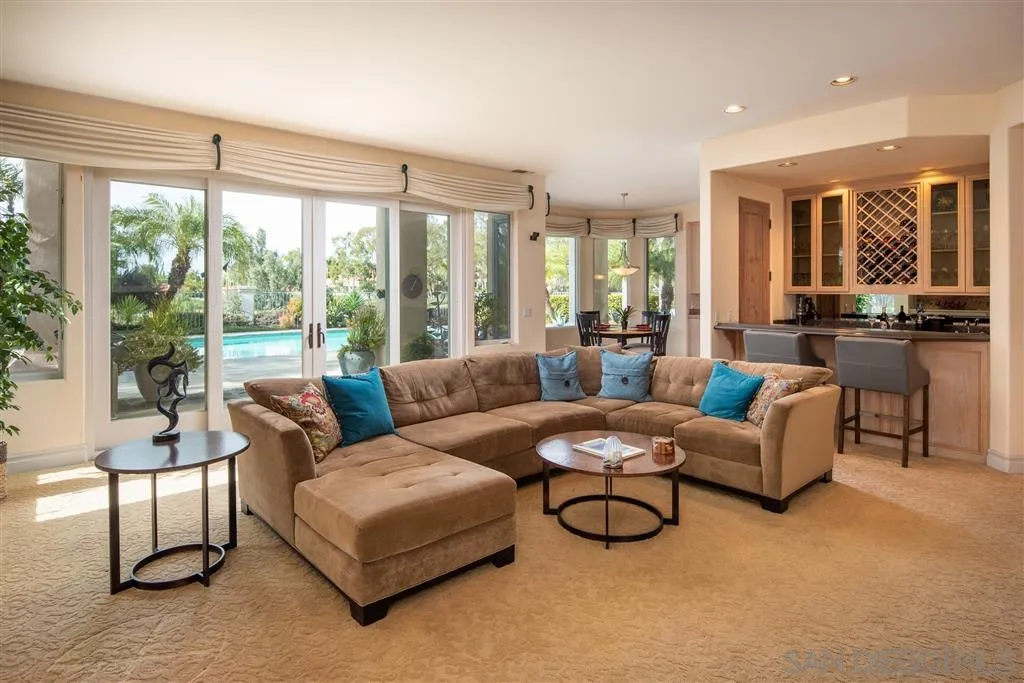 7430 St Andrews Road Rancho Santa Fe, CA 92067 - Photo 16 of 25 a living room with furniture and a large window