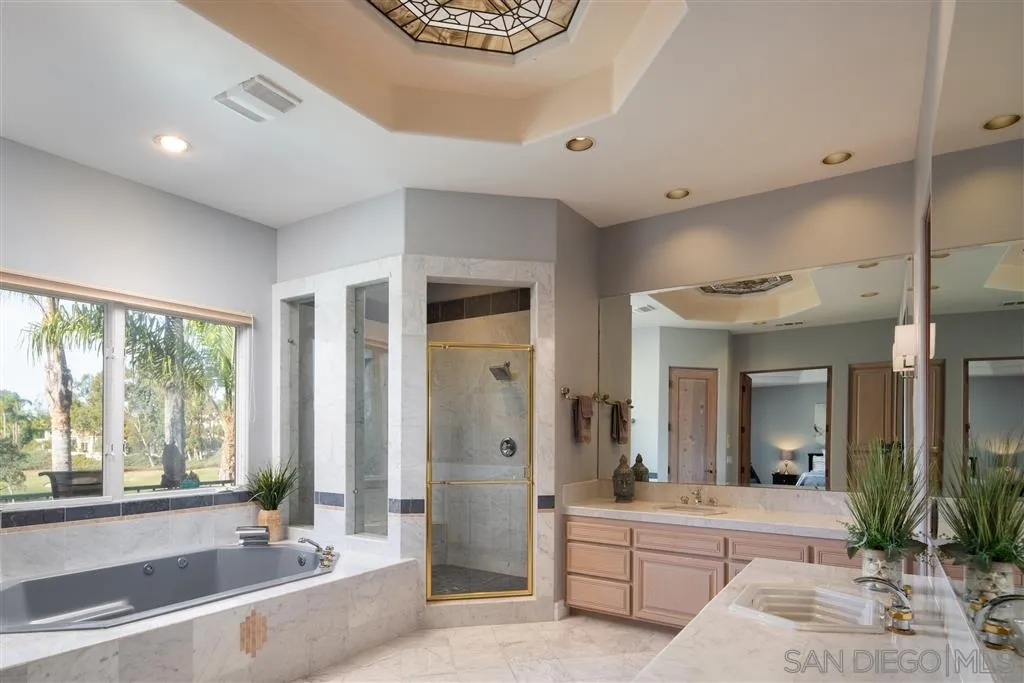 7430 St Andrews Road Rancho Santa Fe, CA 92067 - Photo 20 of 25 a large spacious bathroom with a large tub and shower