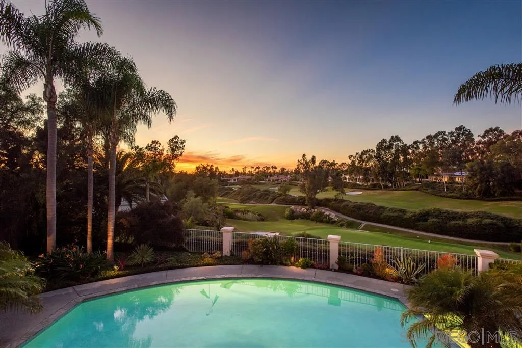 7430 St Andrews Road Rancho Santa Fe, CA 92067 - Photo 2 of 25 an aerial view of a golf course with a lake view