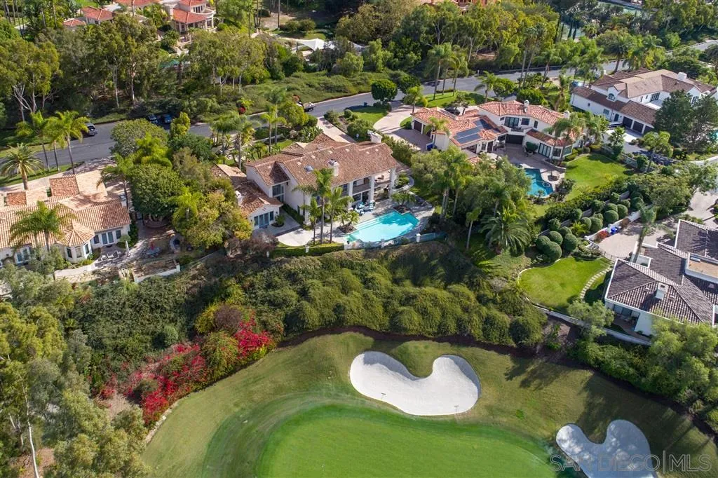 7430 St Andrews Road Rancho Santa Fe, CA 92067 - Photo 3 of 25 an aerial view of a house with a yard and lake view