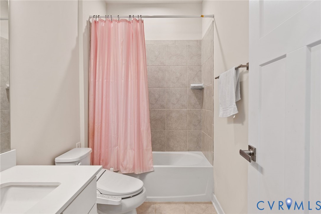 1605 German School Road Richmond, VA 23225 - Photo 21 of 27 a bathroom with a sink toilet and shower