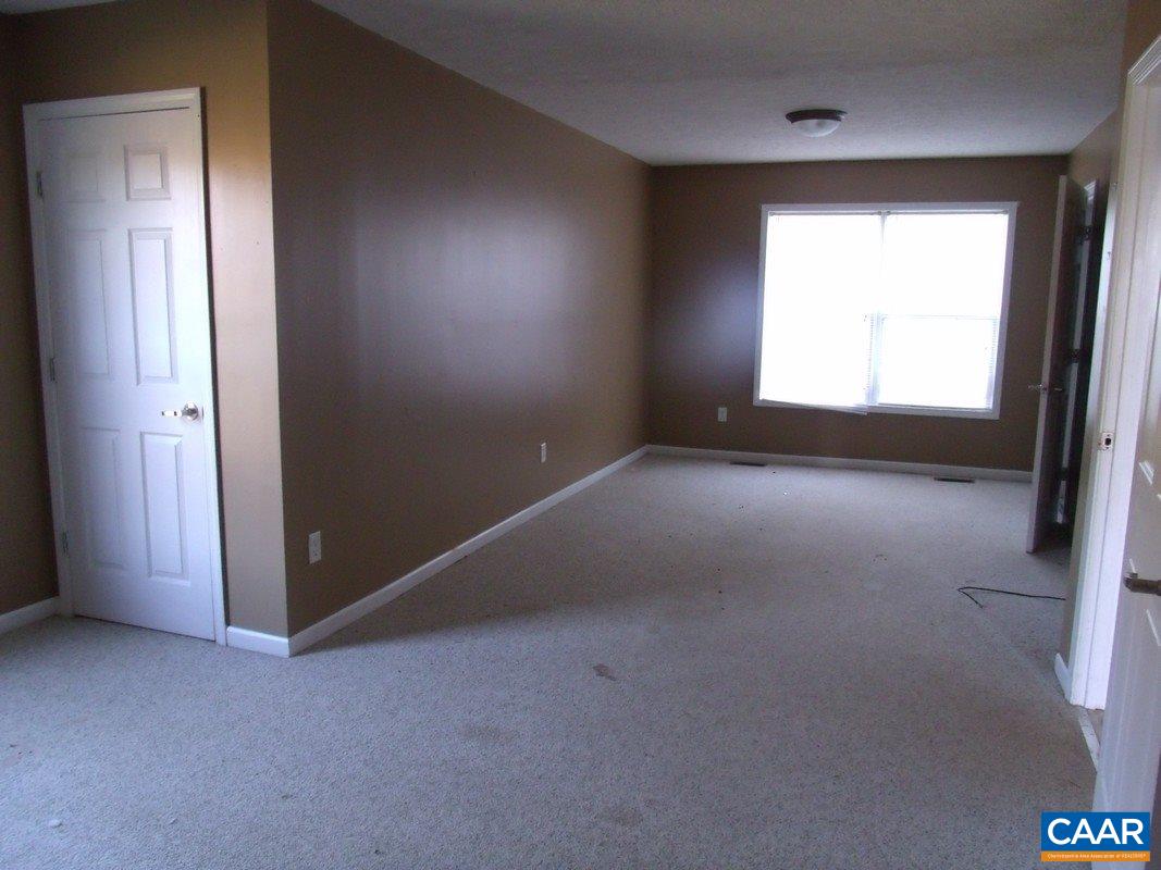 1651 South Constitution Route Dillwyn, VA 23936 - Photo 4 of 13 an empty room with a window