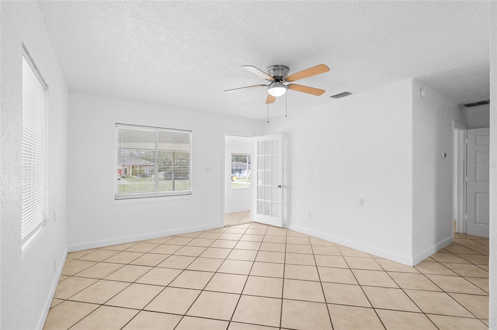 2196 Bell Cheer Drive Clearwater, FL 33764 - Photo 11 of 55 a view of an empty room and window