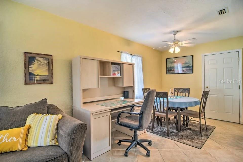 2196 Bell Cheer Drive Clearwater, FL 33764 - Photo 31 of 55 a workspace with furniture and window