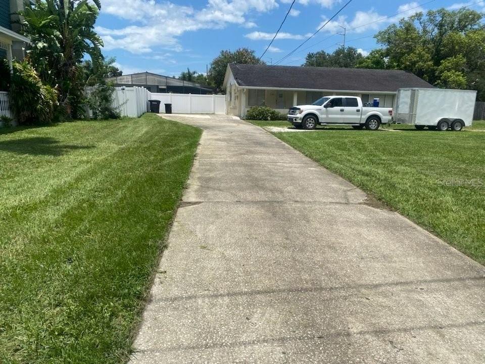2196 Bell Cheer Drive Clearwater, FL 33764 - Photo 43 of 55 a front view of a house with a yard and garage