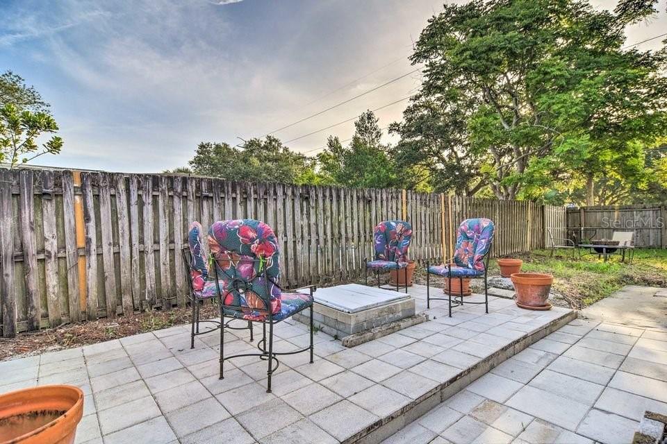 2196 Bell Cheer Drive Clearwater, FL 33764 - Photo 44 of 55 a view of a chairs and tables in the patio