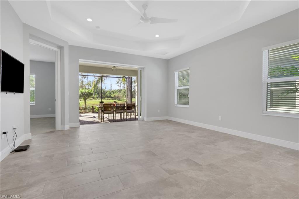 2231 Marquesa Circle Naples, FL 34112 - Photo 13 of 38 a view of an empty room with a window