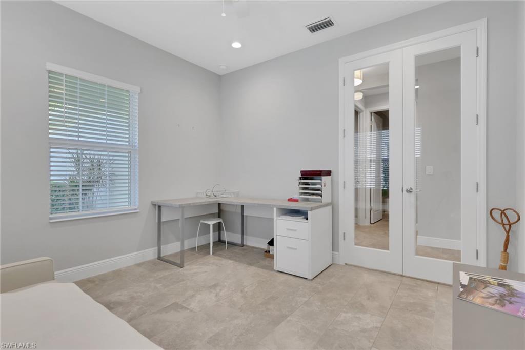 2231 Marquesa Circle Naples, FL 34112 - Photo 23 of 38 a view of work space with windows