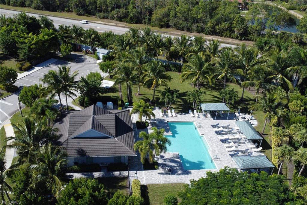 2231 Marquesa Circle Naples, FL 34112 - Photo 33 of 38 an aerial view of multiple houses with yard
