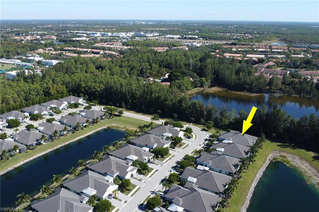 2231 Marquesa Circle Naples, FL 34112 - Photo 35 of 38 a view of a city and a lake