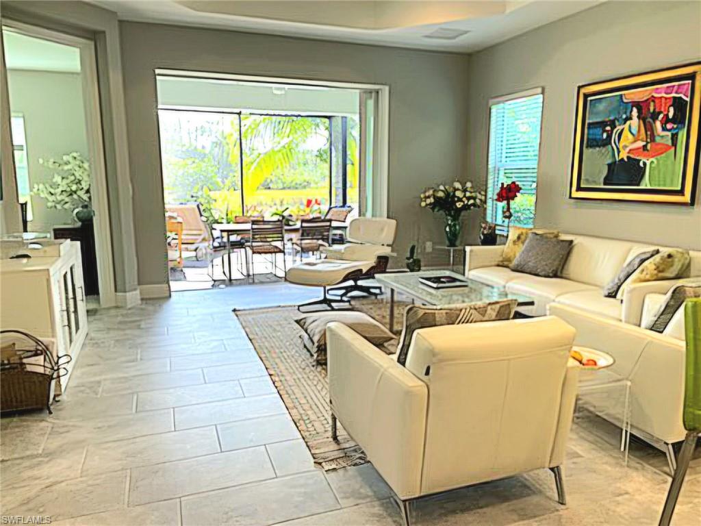 2231 Marquesa Circle Naples, FL 34112 - Photo 38 of 38 a living room with furniture and a large window