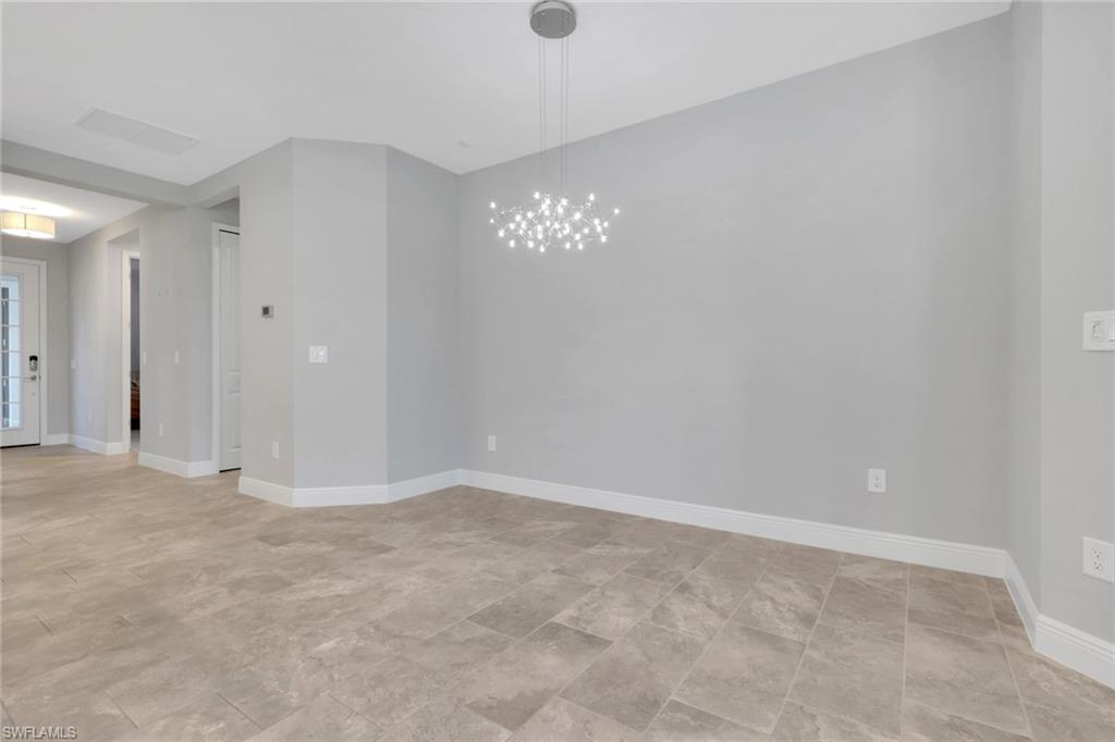 2231 Marquesa Circle Naples, FL 34112 - Photo 7 of 38 a view of an empty room