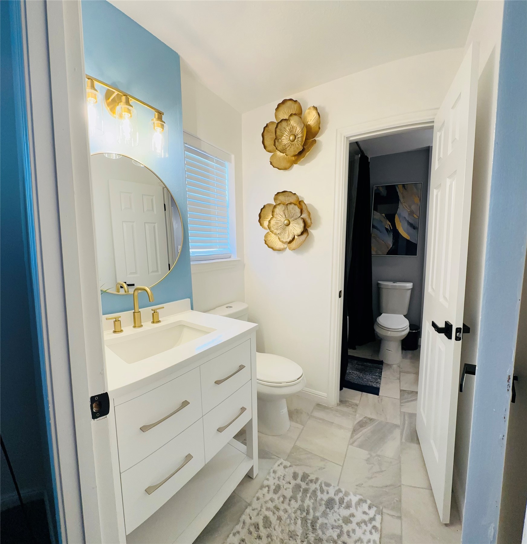 1457 Camellia Street Sweeny, TX 77480 - Photo 18 of 26 a bathroom with a sink a toilet and a mirror