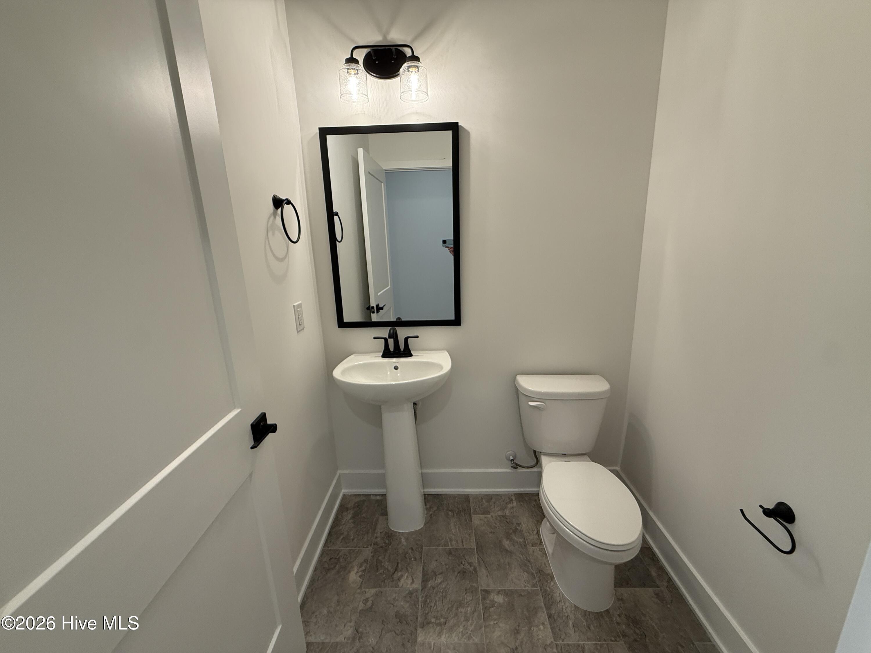 4160 Butler Road Northeast Leland, NC 28451 - Photo 26 of 59 Representative Photo Half bath off kitchen