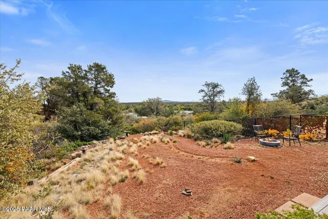 a view of a road with a building in the background