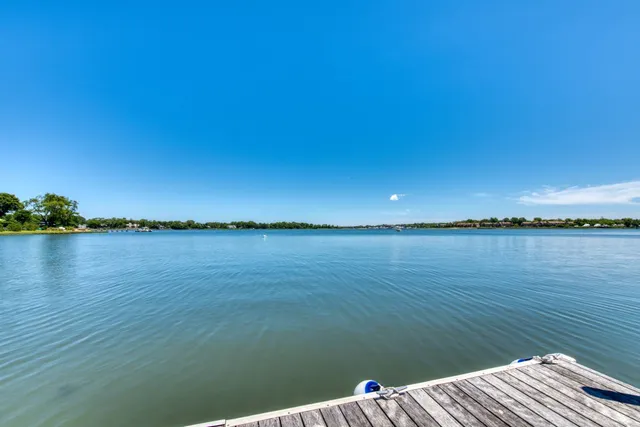 a view of a lake from a balcony