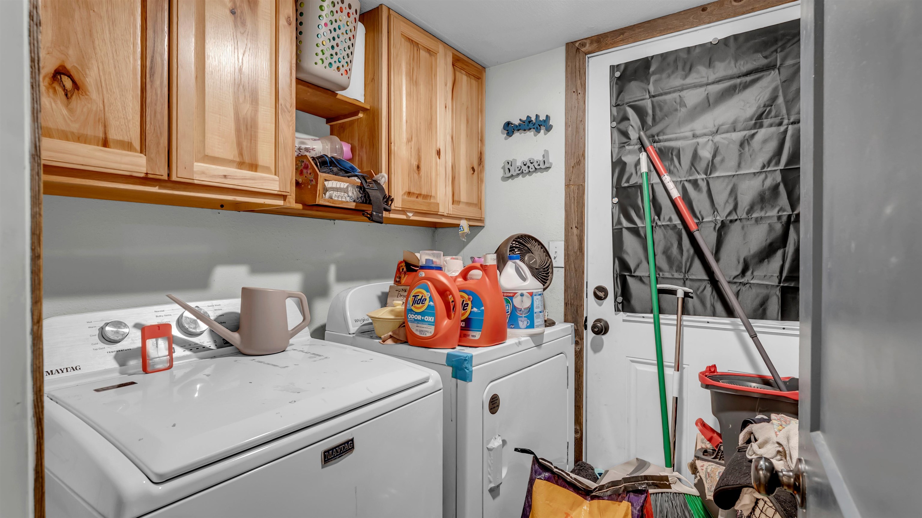 5128 West 29th Highway Bertram, TX 78605 - Photo 18 of 28 a utility room with dryer and washer